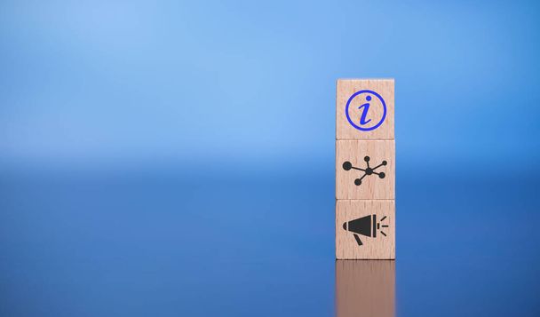 Concept of information with icons on wooden cubes - Photo, Image