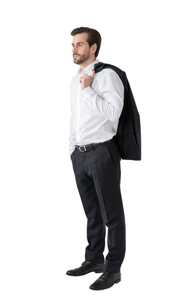Isolated full length portrait of serious young bearded European businessman. Concept of leadership. - Фото, зображення