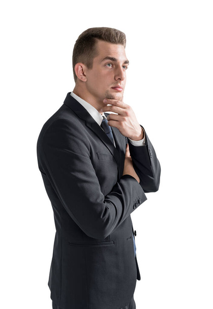 Isolated side portrait of pensive young European businessman. Concept of leadership and planning - Φωτογραφία, εικόνα