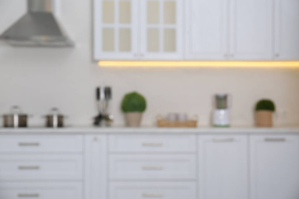 Blurred view of modern stylish kitchen interior - Valokuva, kuva