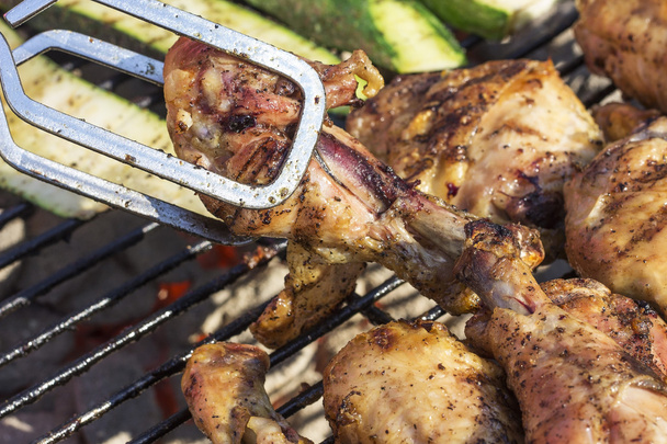 Golden Grilled Wings On Charcoal Grill Being Flipped With Tongs - Photo, Image