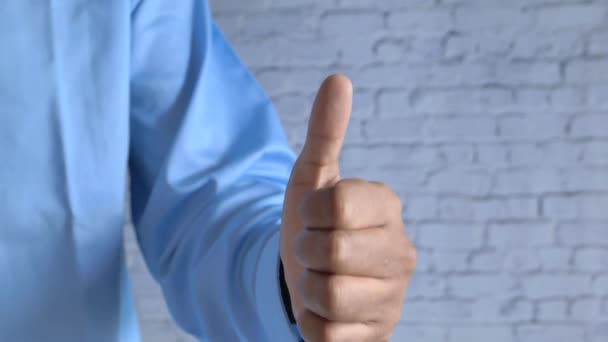  mans hand showing a thumb-up on white background  - Footage, Video