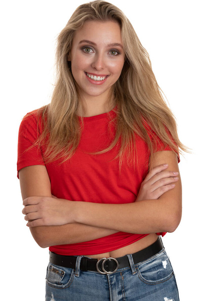 Portrait of a cute teenage girl in red tshirt over white - Foto, Imagen