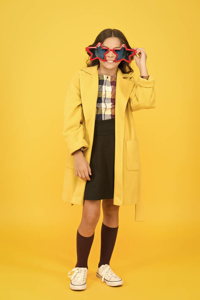 Dreaming about fame. Become popular. Celebrity child. Star concept. Fame and popularity. Cheerful girl wear eyeglasses. Cool kid celebrity. Popular schoolgirl. Carnival costume famous celebrity - Photo, Image