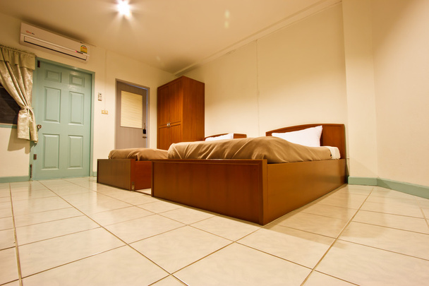 Сучасна спальня в готелі
 - Фото, зображення