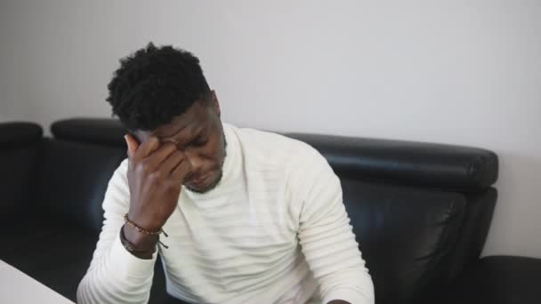 Dissapointed african american black man, frustrated watching tv  - Footage, Video
