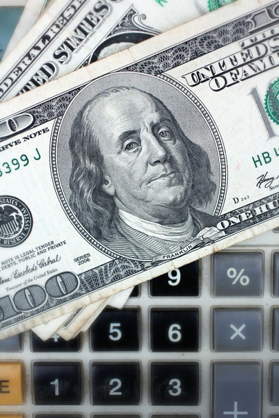 calculadora com dólar
  - Foto, Imagem