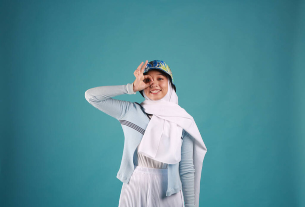 Fashion portrait of young beautiful asian muslim woman with wearing hijab. - Фото, зображення