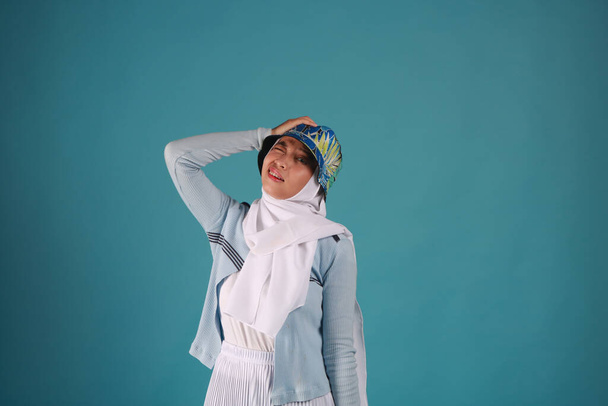 Fashion portrait of young beautiful asian muslim woman with wearing hijab. - Photo, Image