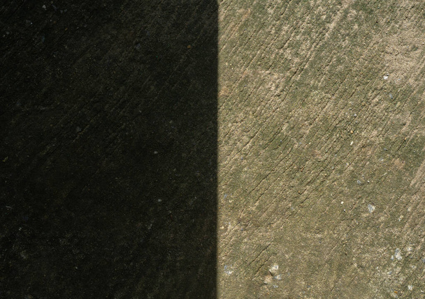 Árnyék és napfény a cementpadlón - Fotó, kép