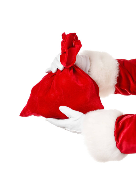 Manos de Santa Claus con bolsa sobre fondo blanco - Foto, Imagen