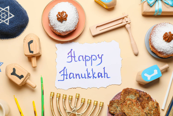 Composition for Hanukkah celebration on color background - Photo, Image
