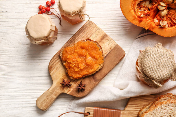 Sandwich with tasty pumpkin jam on table - Φωτογραφία, εικόνα