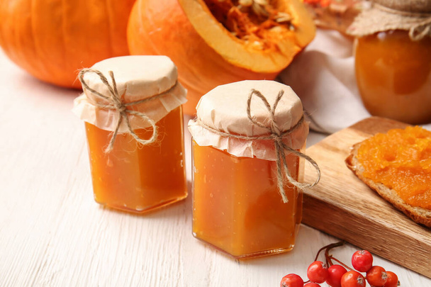 Jars of tasty pumpkin jam on table - Photo, Image