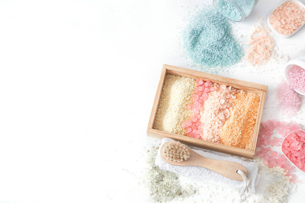 Composition with multi colored sea salt on a white background top view and copy cpace. - 写真・画像