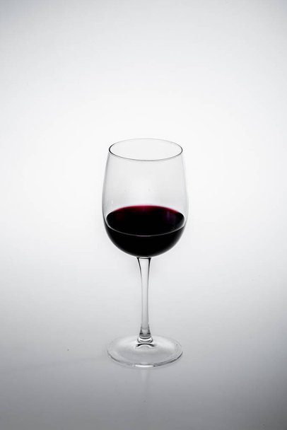 A glass of wine on white background - Fotoğraf, Görsel