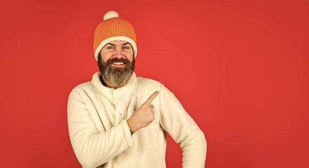 Look at this. mature man posing with funny outfit. man beard in winter hat. portrait of trendy guy wearing hat. Male winter style. Modern winter knitted hat. Funky happy bearded man. copy space - Фото, изображение