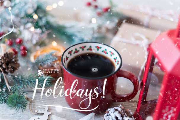 Winter hot drink, cacao with marshmallows and cinnamon or spicy hot chocolate in red cup. Merry Christmas. Festive vintage background. Happy holidays text. - Foto, imagen