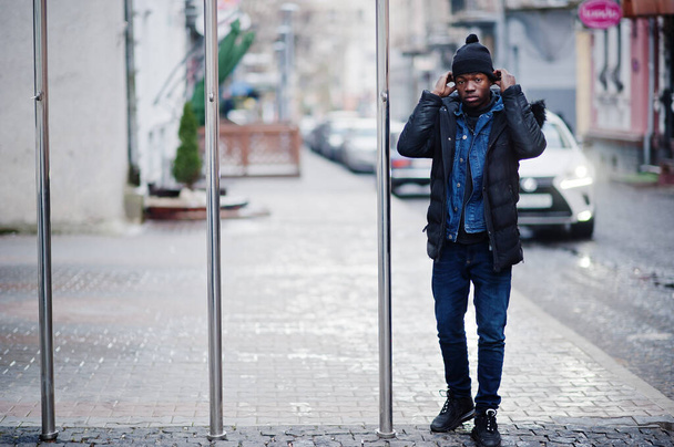 African man wear on jacket and black hat at cold weather posed outdoor. - Φωτογραφία, εικόνα