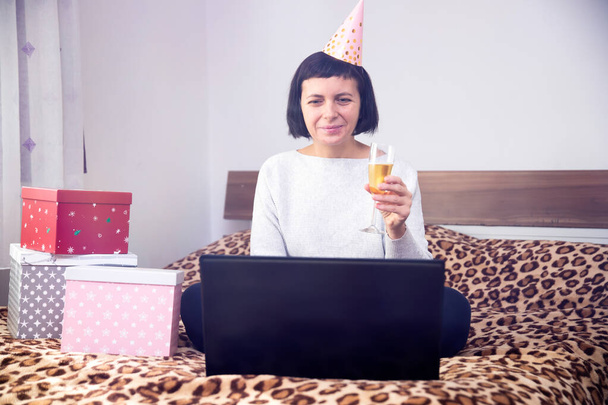 Woman celebrating birthday, Cristmas or New Year online in quarantine time. - Zdjęcie, obraz