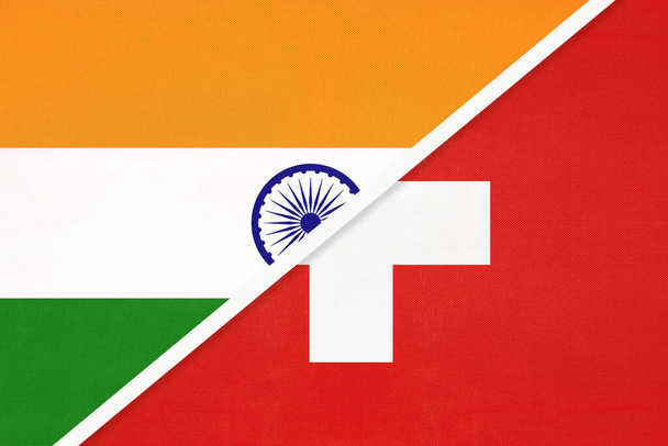 India and Switzerland or Swiss Confederation, symbol national flags from textile. Relationship, partnership and championship between two countries. - Photo, Image