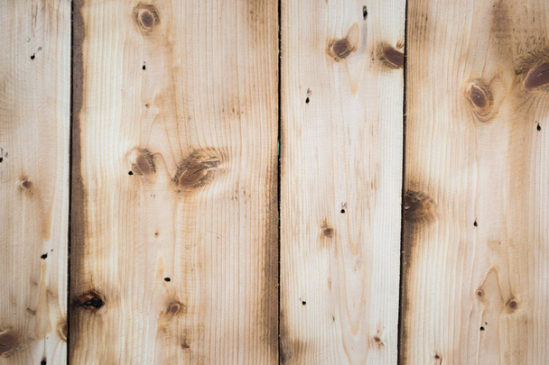 Natural wood plank texture with knots and other surface roughness - Foto, imagen