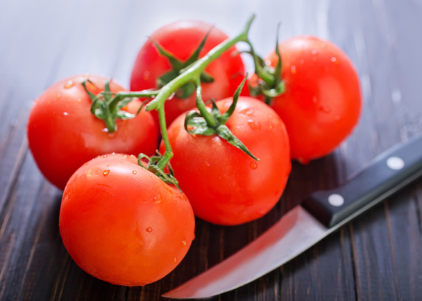 Tomato on table - Foto, Bild