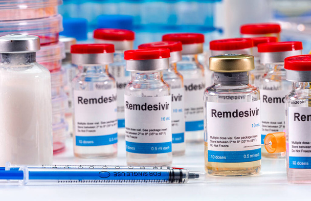 Медикаменти, приготовані для людей, постраждалих від Ковід-19, Редесивір є селективною антивірусною профілактикою проти вірусу, який вже знаходиться в експериментальному використанні, концептуальним зображенням. - Фото, зображення