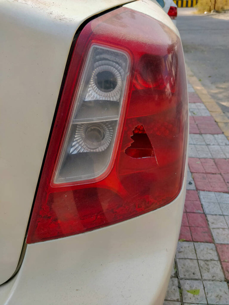 Closeup of broken cover of a car rear lamp. - Photo, Image