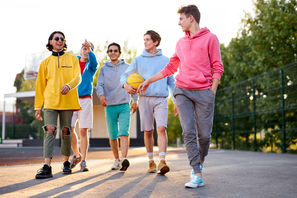 friendly group of caucasian teenagers boys ready to play basketball - Photo, Image