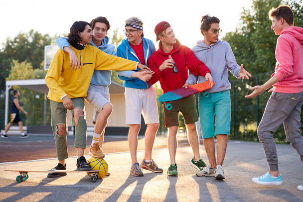 city teenagers have fun outdoors at sport playground, in the park - Foto, Bild