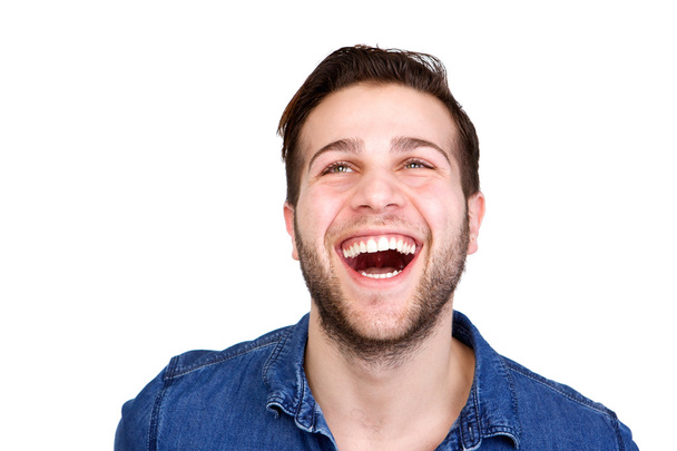 vrolijke jonge man lachen - Foto, afbeelding