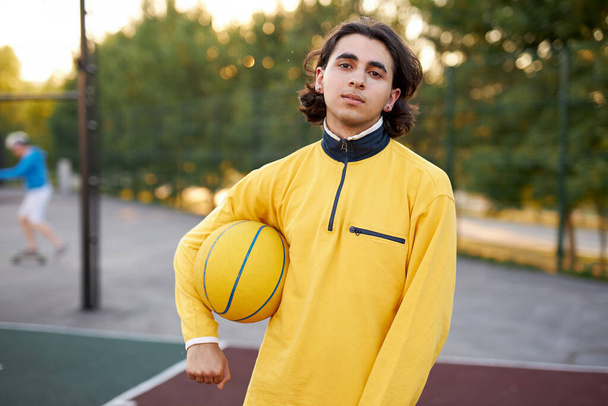 portrait of sportsman young boy with ball - Фото, изображение