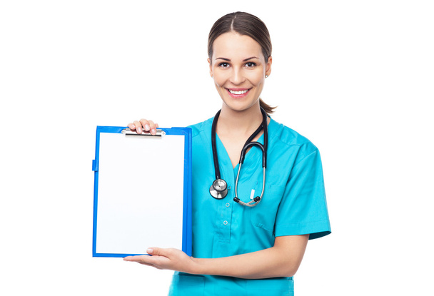 Female doctor holding a clipboard - Zdjęcie, obraz