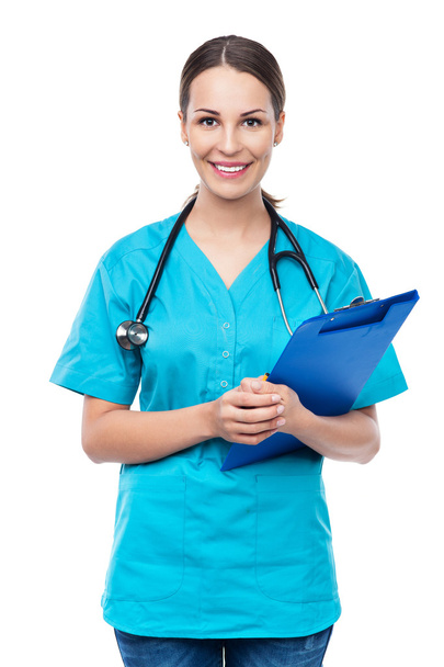 Female doctor holding a clipboard - Fotó, kép