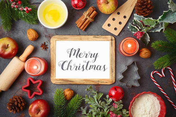 Christmas holiday cooking and baking background with photo frame mock up template, kitchen utensils and ornaments. - Foto, Imagem