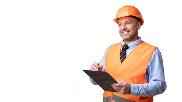 Builder Holding Folder Taking Notes Looking Aside Over White Background - Foto, afbeelding