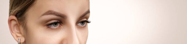 Eyelash Extension Procedure. Beautiful Woman with Extreme Long False Eyelashes. Makeup, Cosmetics. Beauty, Skincare. - Photo, Image