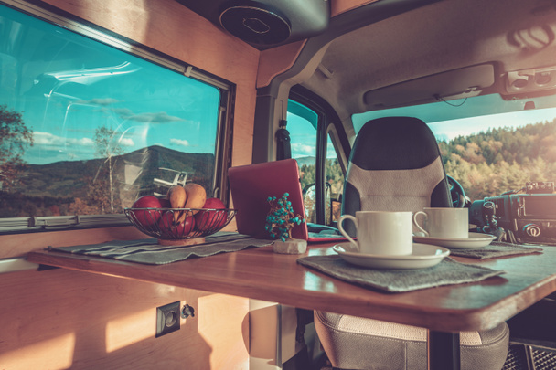 Camping Time Inside Comfortable Motorhome Interior. Stylish Self Made Camper Van Interior. Van Conversion Theme. - Photo, Image