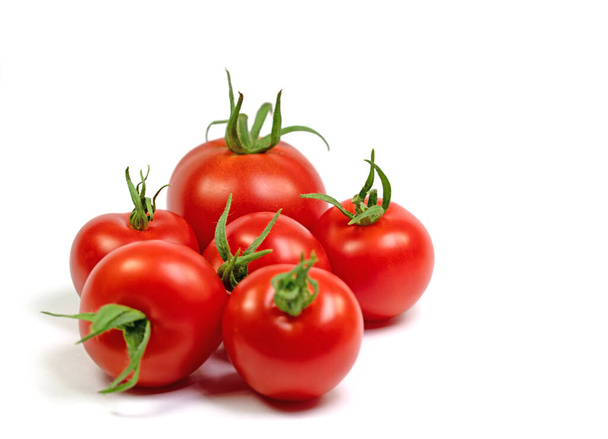 Red tomatoes against white background - Fotoğraf, Görsel
