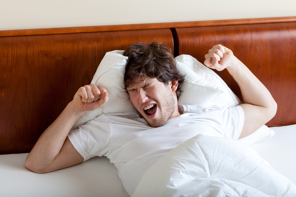 Yawning man after awakening - Фото, зображення
