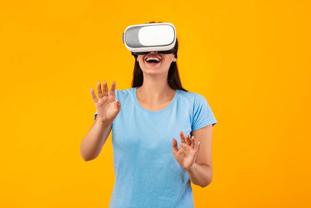 Woman wearing virtual reality headset at the studio - Photo, Image