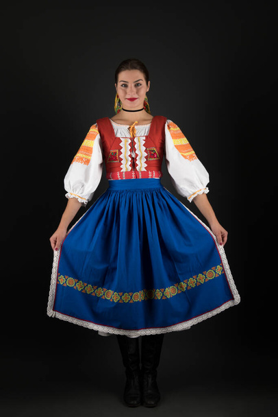 Young beautiful girl in slovak folk dress. Slovak folklore.  - Zdjęcie, obraz