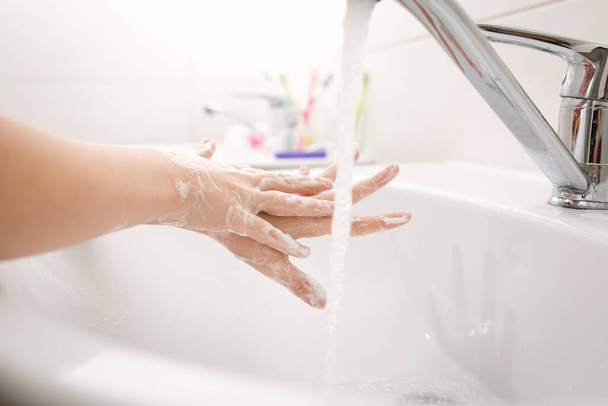 Washing hands with soap. - Photo, Image