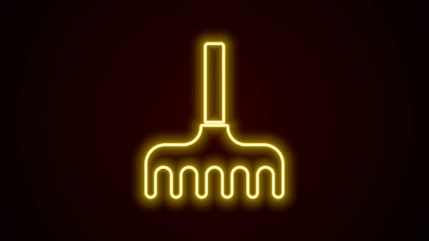 Glowing neon line Garden rake icon isolated on black background. Tool for horticulture, agriculture, farming. Ground cultivator. 4K Video motion graphic animation - Footage, Video