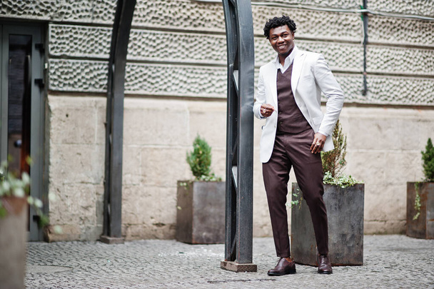 Thoughtful young handsome african american gentleman in formalwear. Black stylish model man in white jacket. - Foto, Bild