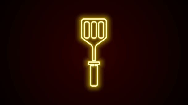 Leuchtende Leuchtschrift Spatel-Symbol isoliert auf schwarzem Hintergrund. Küchenspachtel-Symbol. Grillspachtel-Schild. Grill und Grillwerkzeug. 4K Video Motion Grafik Animation - Filmmaterial, Video