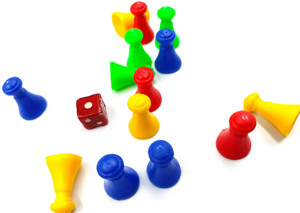 Board game Pieces and Dice over a plain white background. - Photo, Image