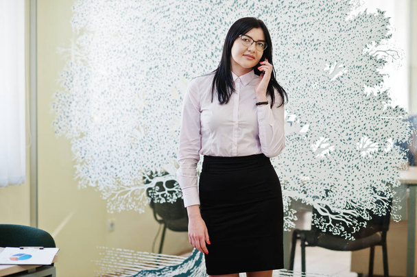 Portrait of young business woman bank worker in modern office. - Фото, изображение