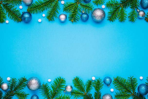 Blue Christmas background with border. Top view, copy space for festive text - Photo, Image
